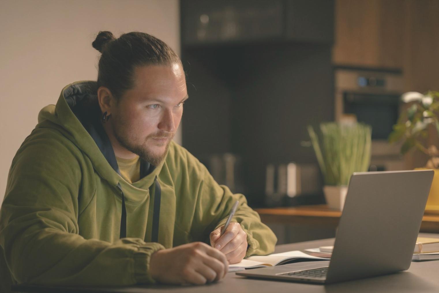 Professional analyzing financial statements on computer screen