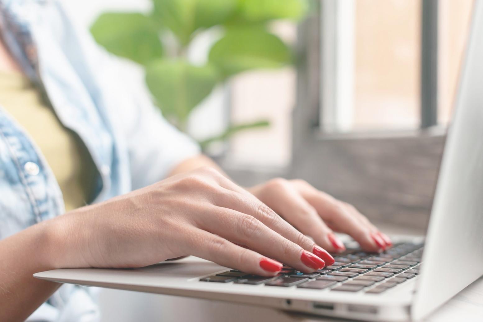 Business professional reviewing financial documents and analysis reports